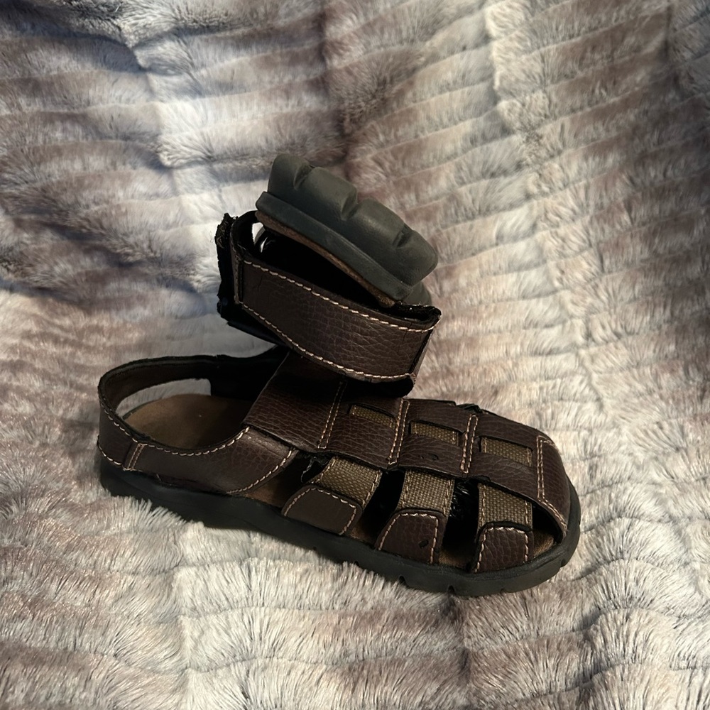 Smart fit brown sandal and blue sketchers.